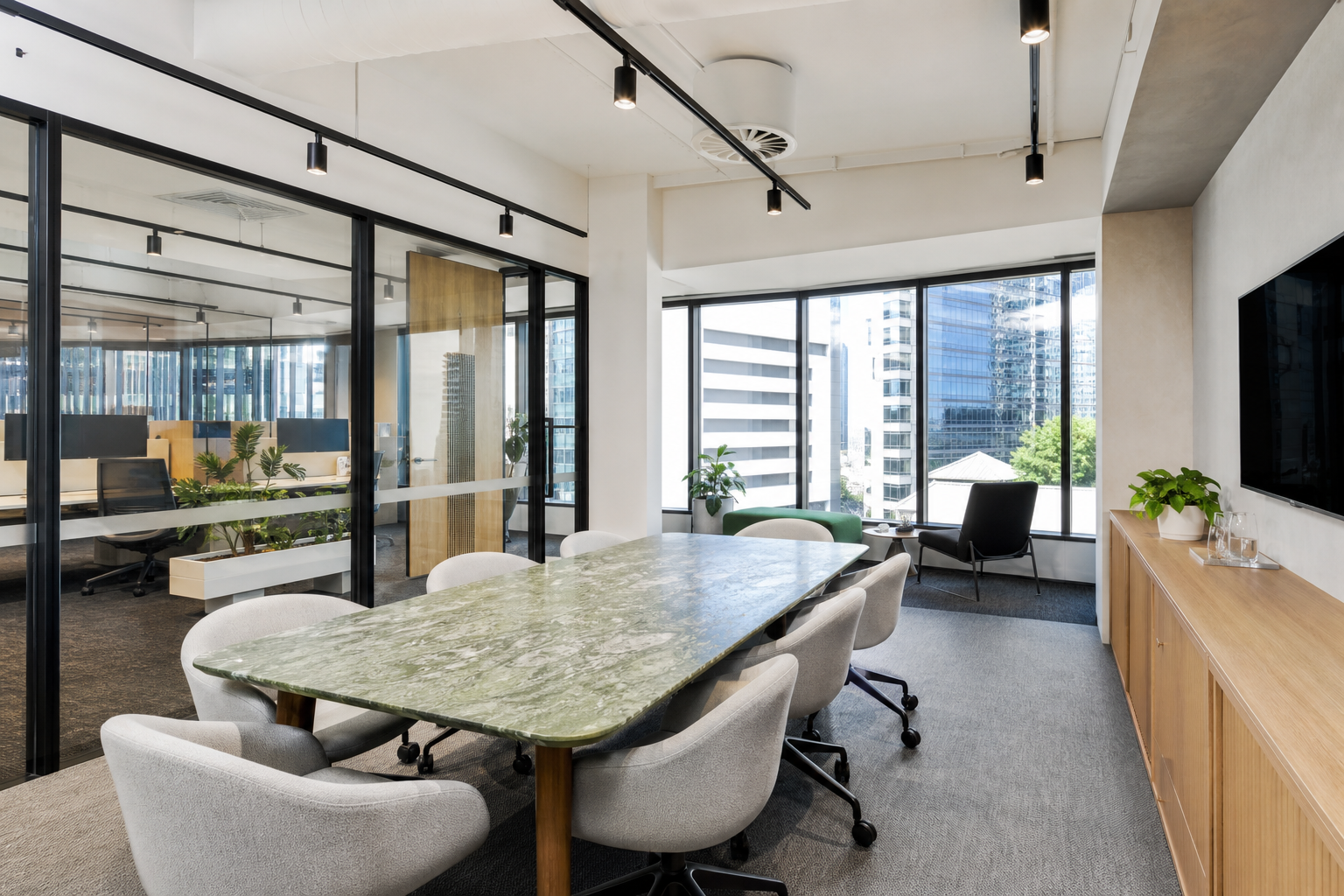 Completed meeting room from a complete office fitout in Sydney with glass partitions