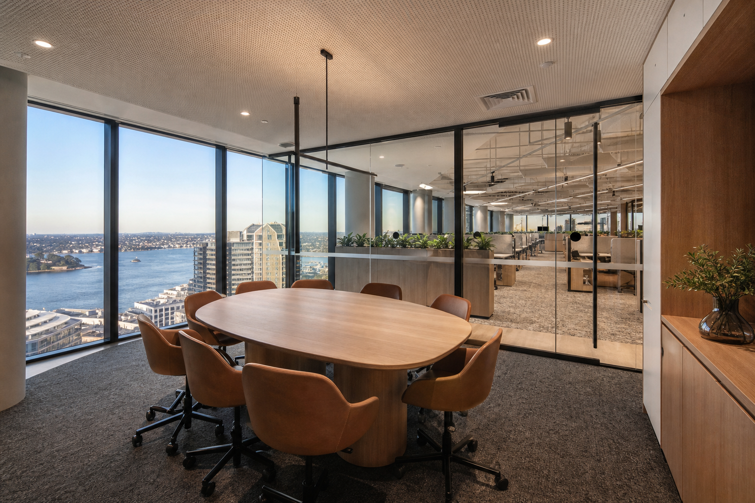 Completed modern Sydney office fitout meeting room with glass partitions and harbour view